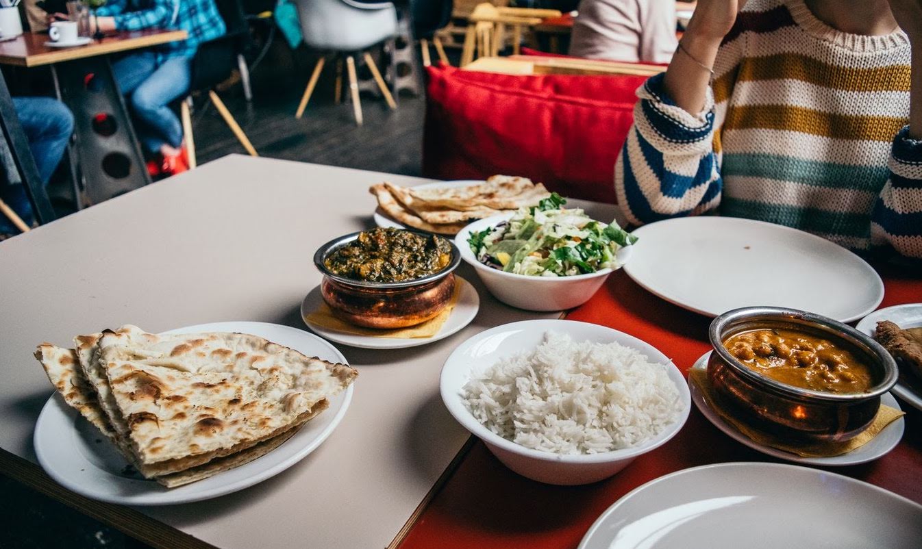 A spread of pita, rice, and chickpeas